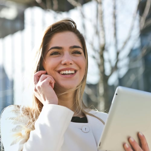 person smiling on phone